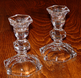 Pair of clear short candlesticks
Unknown maker, but believed to be contemporary Polish 24% lead crystal. This design is offered for sale on the clinq.com website.
