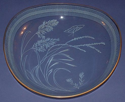 Filigranglas glass dish
Three sided with rounded corners. 9.5" diameter, 2" deep. Unknown pattern  but believed to be Filigranglas made in Germany
Keywords: Filigranglas Slumped Germany