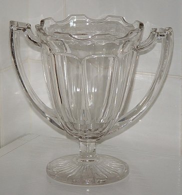 Trophy-style vase
Possibly US glass? This looks like a cross between Chippendale and the US Glass pattern 15309 called Betsy Ross.
Keywords: pressed