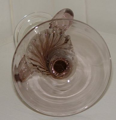 Base of Unknown Candlestick in clear and purple-brown glass
