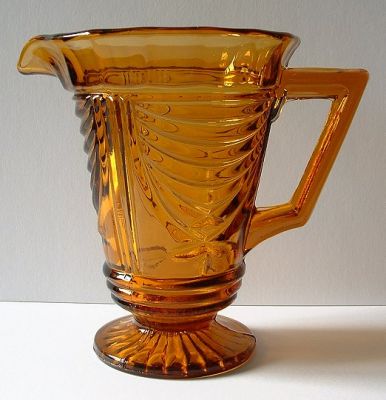 Sowerby 2550 water jug in amber
Keywords: Sowerby pressed England