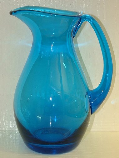 Krosno blue jug
Peacock blue jug with polished pontil - believed to be Krosno, Poland
Keywords: Krosno Poland mouldblown