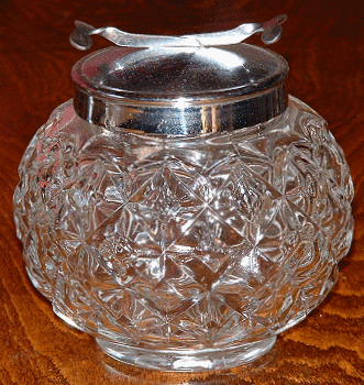 Sugar lump bowl with chrome lid and integral tongs
Unknown maker
