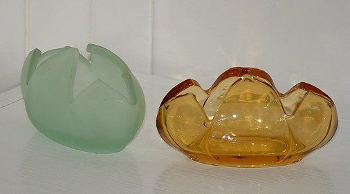Bagley Tulip Posy Vases
Clear amber and satin green Bagley Tulip posy vases. Rd. no. 870054, 1950's.
Keywords: Bagley pressed England