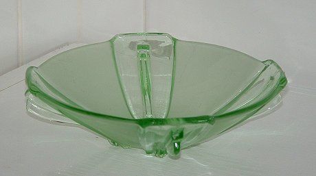 Stoelzle green winged bowl - side view
Unknown maker,  probably Czech

Now identified by Marcus Newhall on the GMB as Stoelzle, Hermannshutte, Czechoslovakia. 
GMB topic: [url]http://www.glassmessages.com/index.php/topic,20628.0.html[/url]

Keywords: pressed Czech Stoelzle Hermannshutte