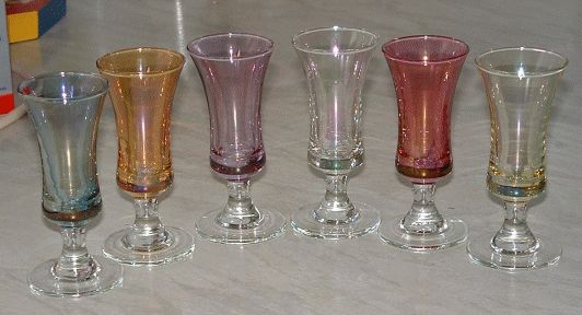Astra Glass liqueur glass set
Clear stems and feet, with different coloured iridescent bodies. Probably 1950's.
Keywords: Astra