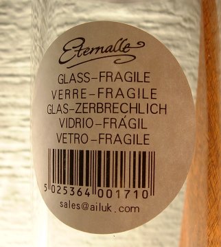 Eternalle bubble based vase - label detail
Clear glass vase with pierced bubble base. Paper label states Eternalle. No country of origin.
Keywords: Eternalle