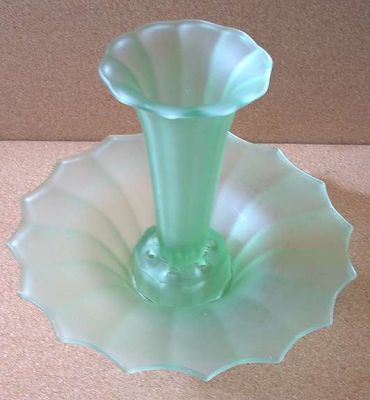 Pressed glass flower set
Satin green pressed glass, two-piece slower set. No maker's marks. 
