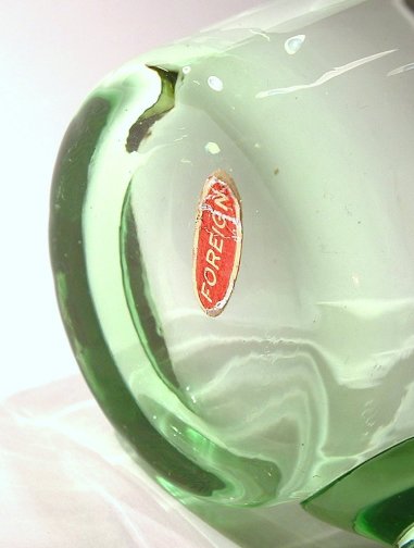 Green, ribbed, handled glass - base and label
Unknown maker
